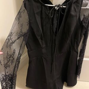 Black romper with lace mesh arms